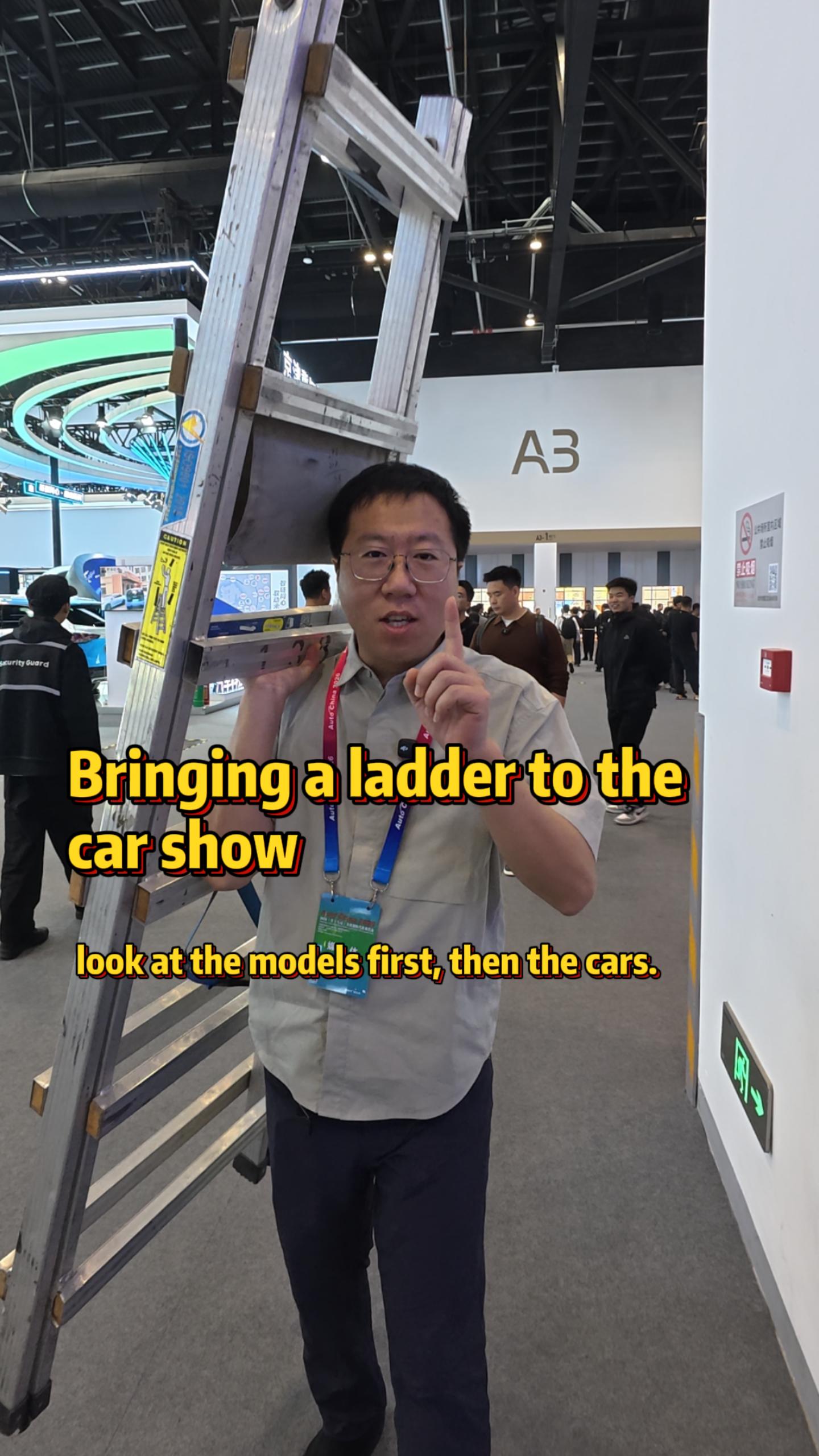 Beijing Auto Show: Professional media on site, beauties first then cars.